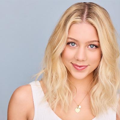 a woman posing for a headshot